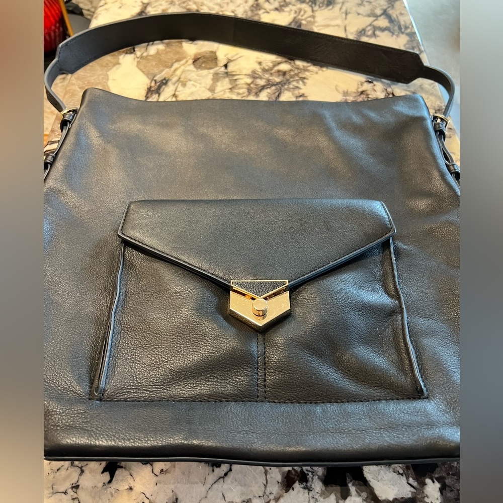 Covet black leather tote